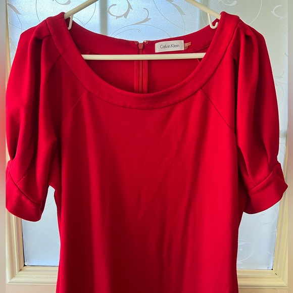 Calvin Klein size 14 red knee length knit dress with zip up back puff sleeves. - Picture 6 of 7